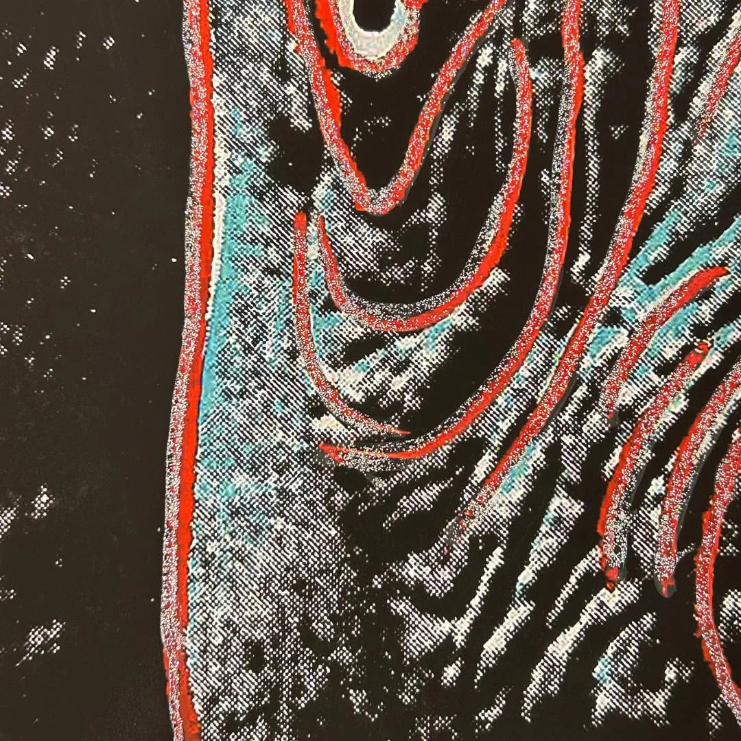 Close-up of diamond dust application on print.