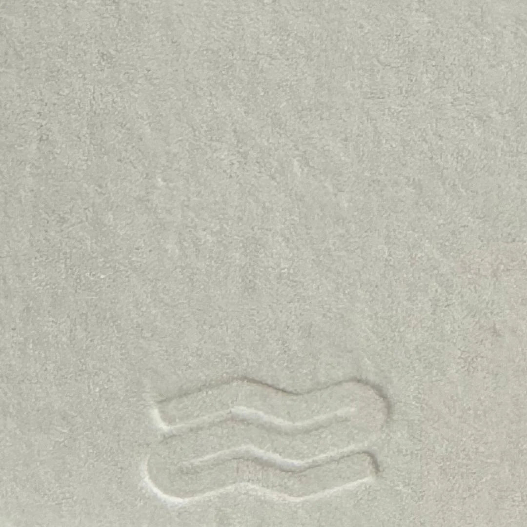 Close-up of textured gray surface with subtle patterns
