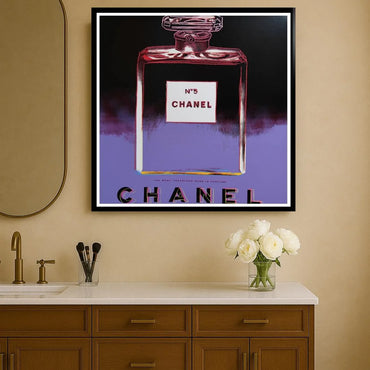Framed Chanel No. 5 perfume painting on a wall above a bathroom vanity. Luxury home Decor Inspiration.