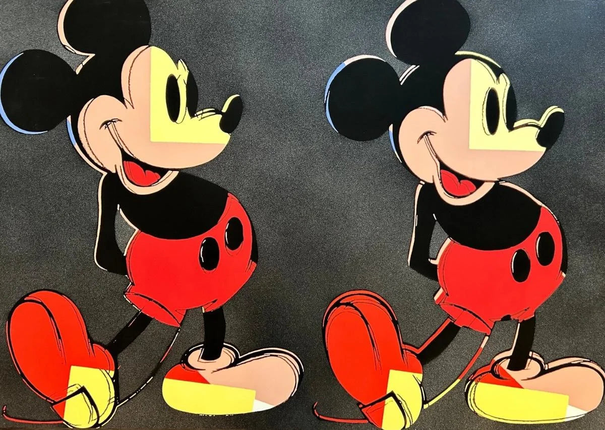Two identical cartoon characters with red shorts and yellow shoes on a dark background