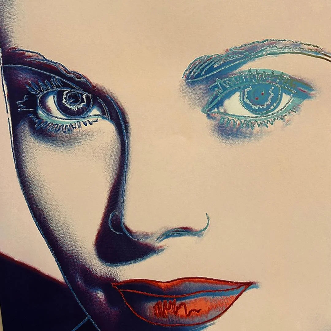 Artistic illustration of a face with stylized eyes and lips on a beige background