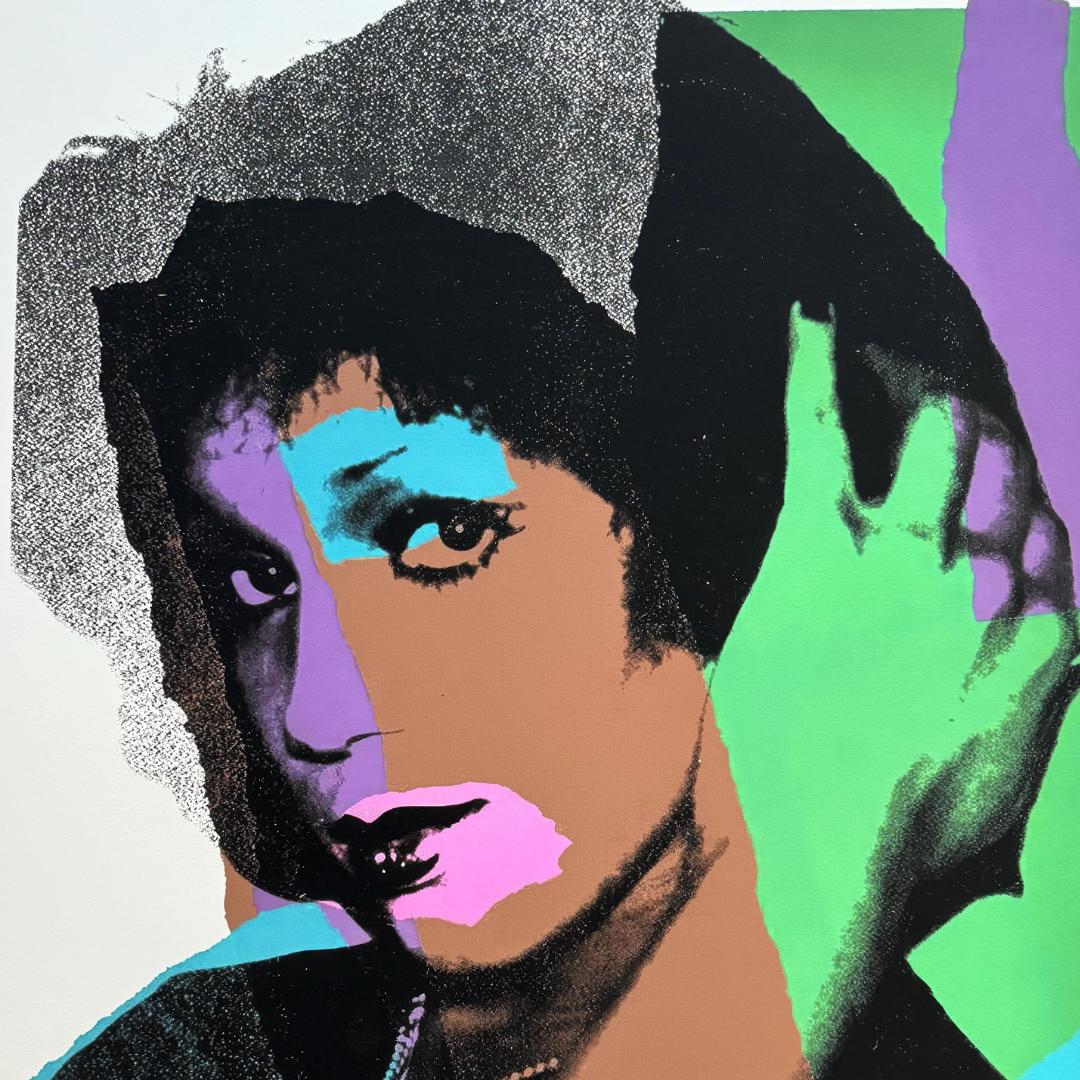Colorful abstract portrait with a hand on a green background
