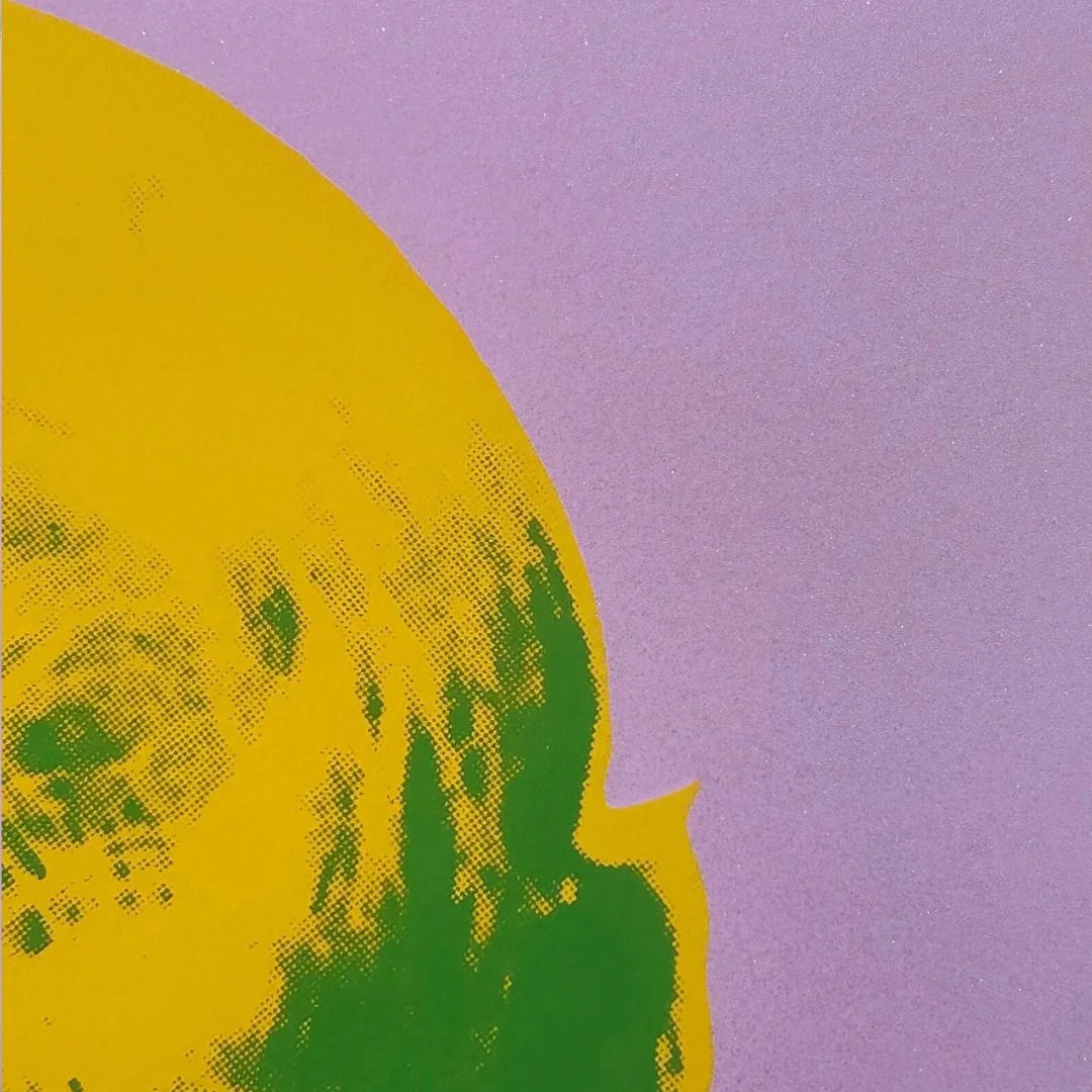 Colorful famous Warhol Pop Art portrait of Marilyn Monroe with a purple diamond dust background Closeup details.