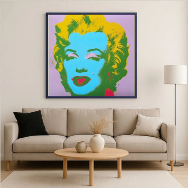 Colorful famous Warhol Pop Art portrait of Marilyn Monroe with a purple diamond dust background in a living room.