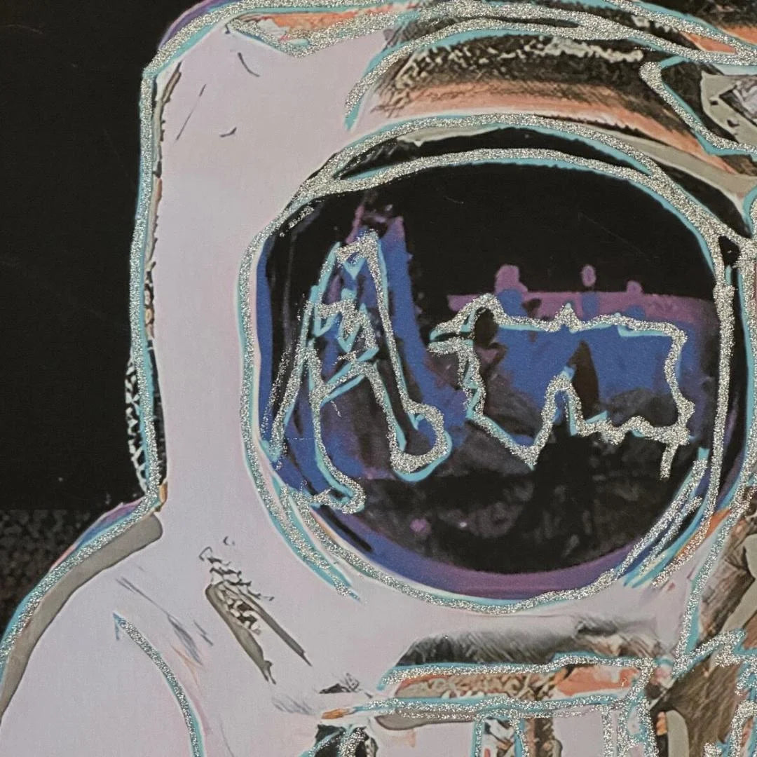 Close-up of an astronaut in a space suit with reflective visor