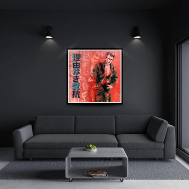 Framed poster of Andy Warhol's James Dean on a wall above a gray sofa in a modern living room.