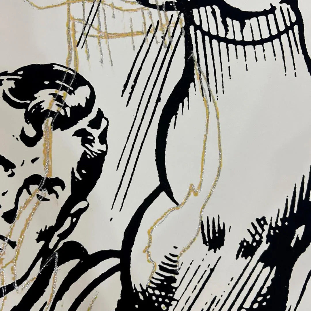 Details on the quality of print for Andy Warhol's Superman white trial with gold diamond dust.