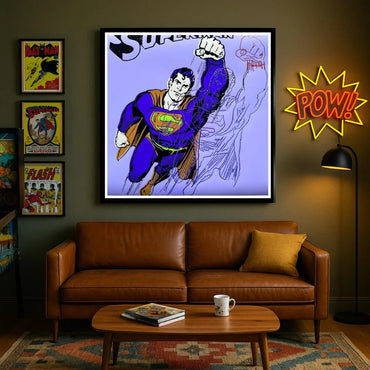 Modern Mancave Idea with a framed superhero poster, neon 'POW!' sign, and brown leather sofa.