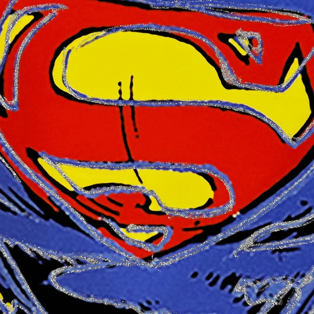 Superman logo with red and yellow design on a blue background with diamond dust.