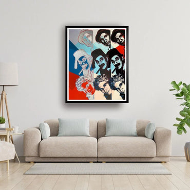 Framed artwork above a beige sofa in a living room setting