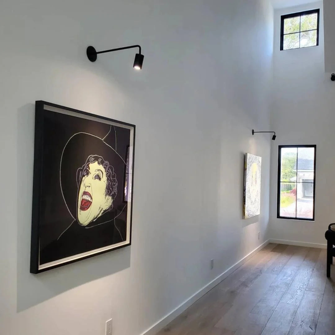 Modern interior with framed artwork on a white wall