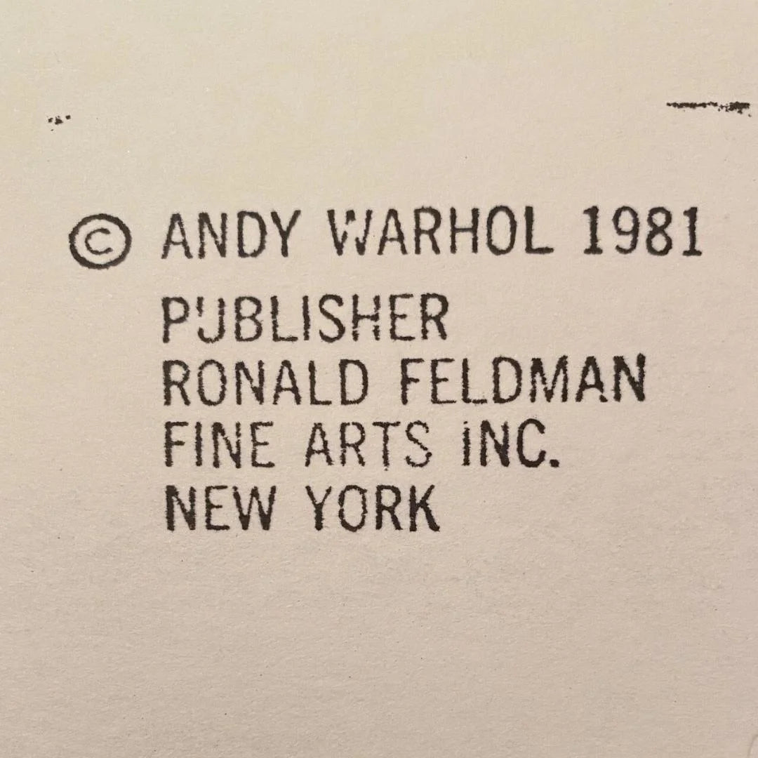 Text attribution to Andy Warhol and Ronald Feldman Fine Arts Inc. on a beige background