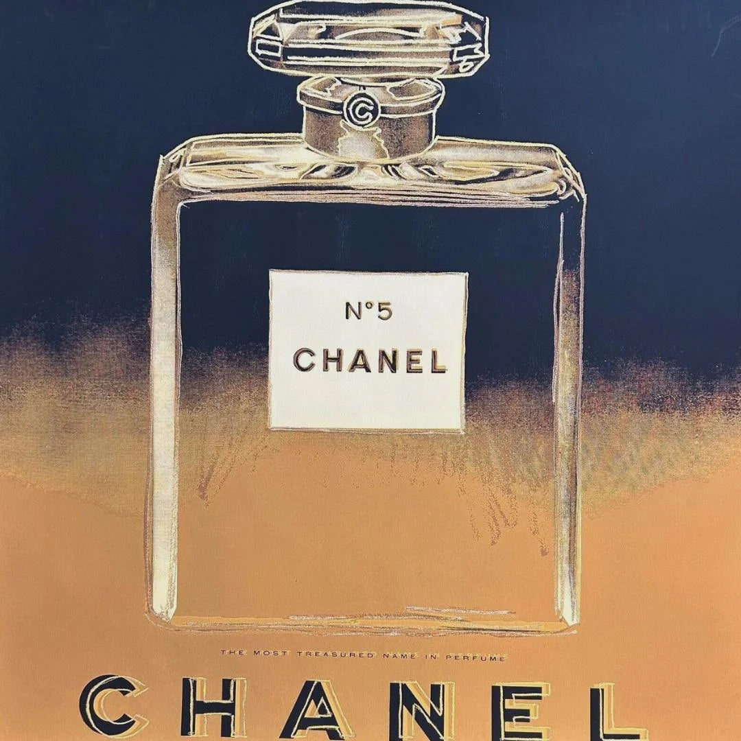 Chanel No. 5 perfume bottle on a gradient background