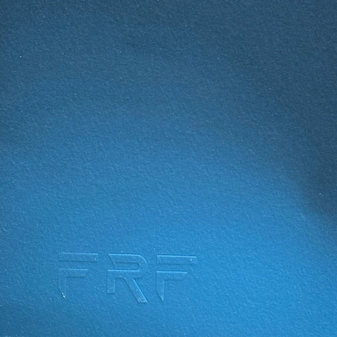 Blue textured surface with 'FRF' branding