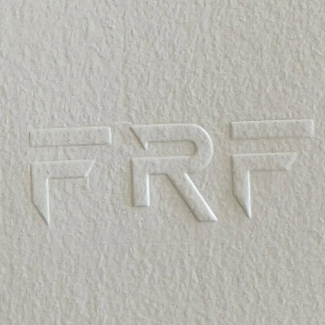 Textured beige paper with embossed publisher