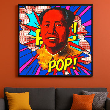 Framed artwork of a colorful pop art portrait of Mao Zedong with 'POP!' text on an orange wall above a gray sofa.