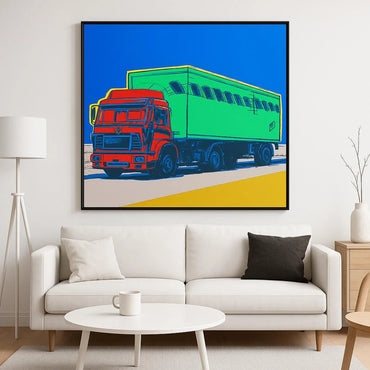 Colorful truck painting on a wall above a white sofa in a living room.