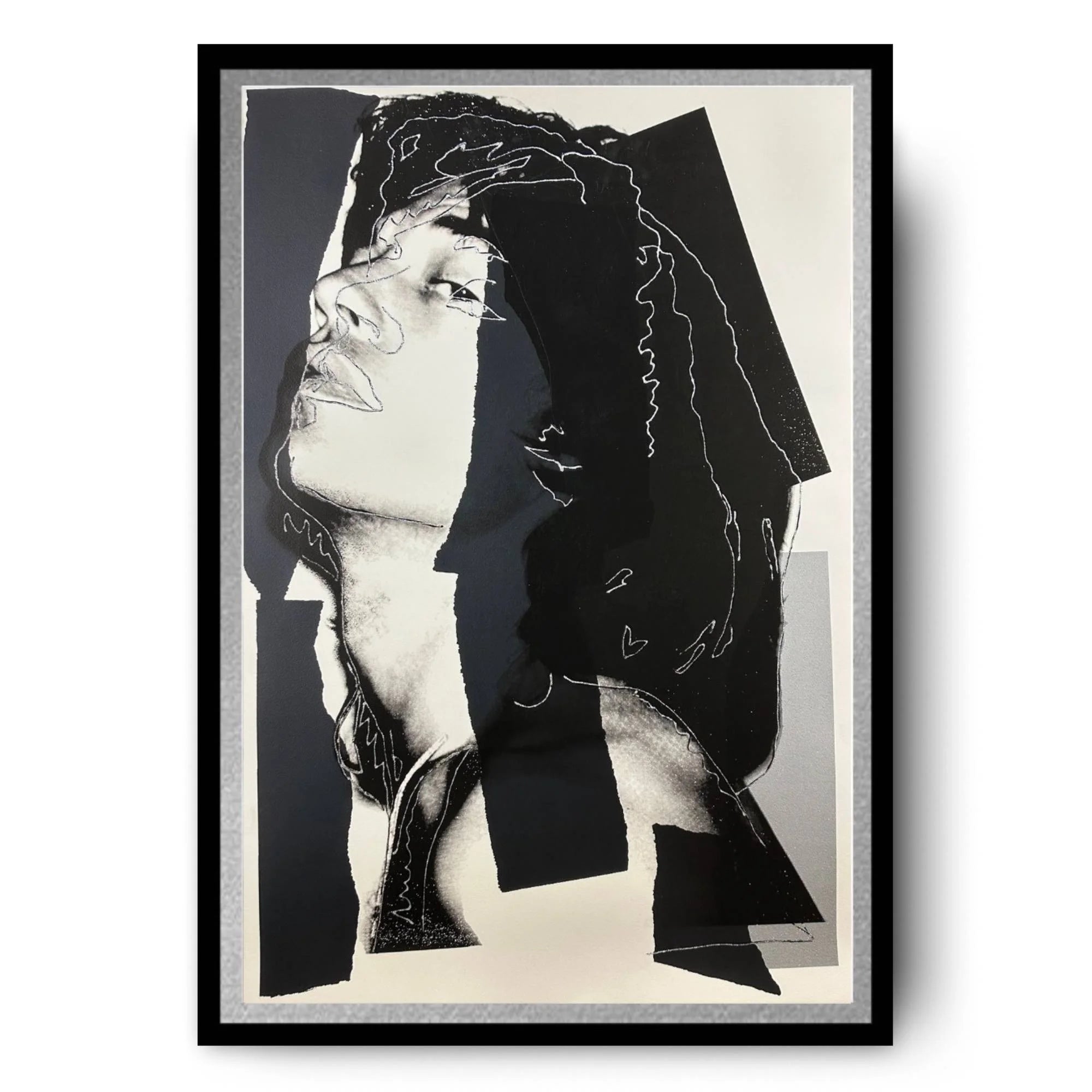 Framed black and white artwork of a woman with abstract elements.