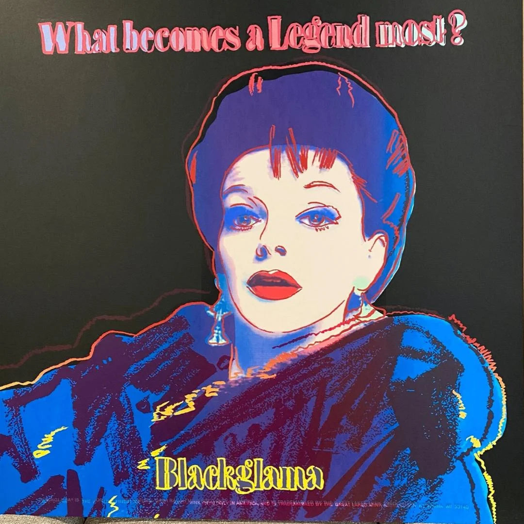 Album cover with stylized portrait and text 'What becomes a Legend most?' and 'Blackglama'.