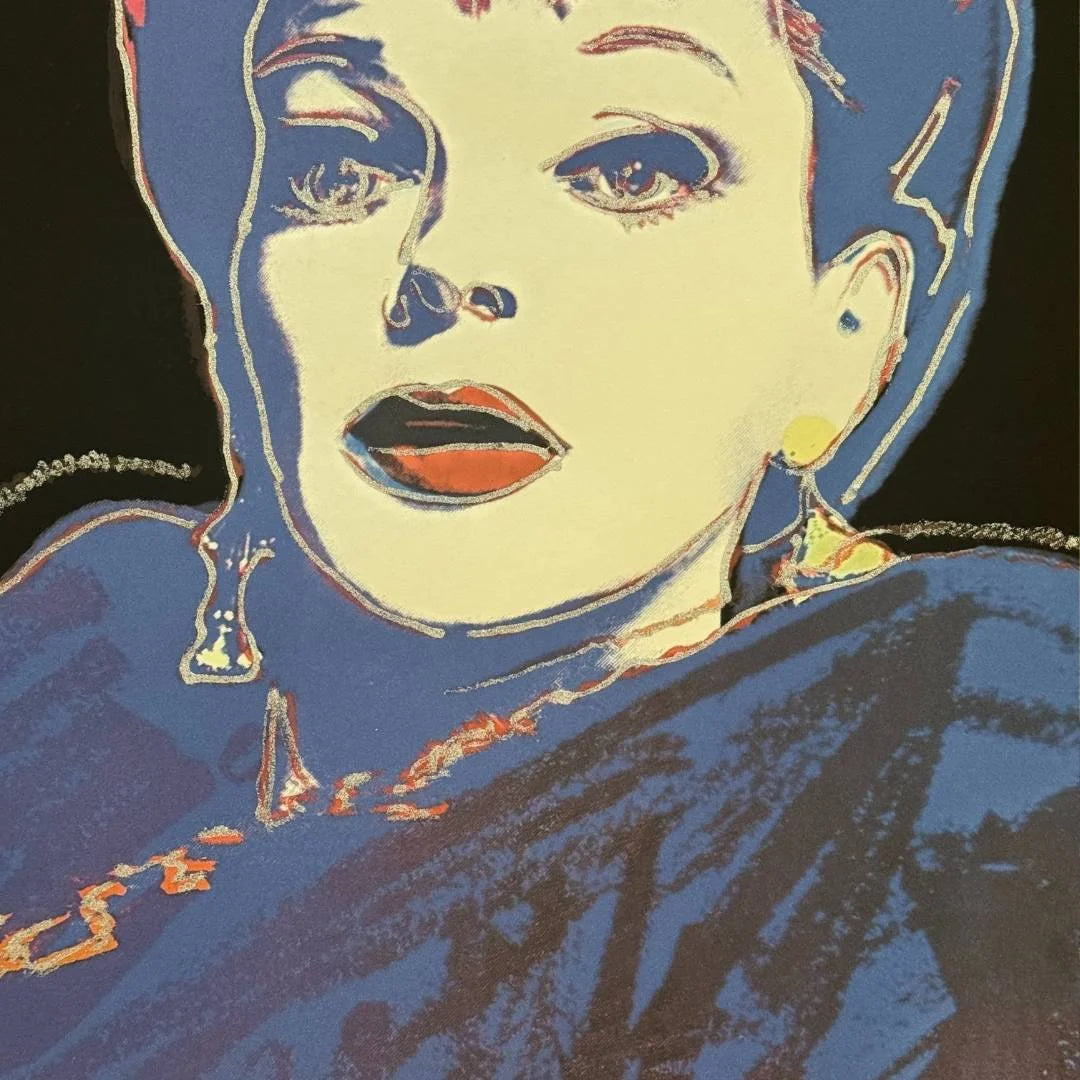 Artistic depiction of a woman's face with stylized makeup and jewelry on a dark background