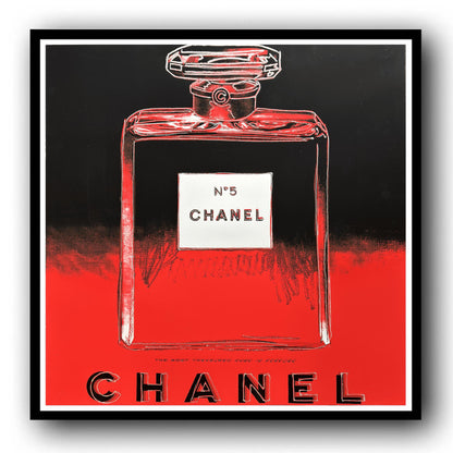 Framed artwork of a Chanel No. 5 perfume bottle on a red and black background
