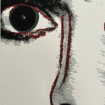 Artistic depiction of an eye with a red line running down the face on a textured background