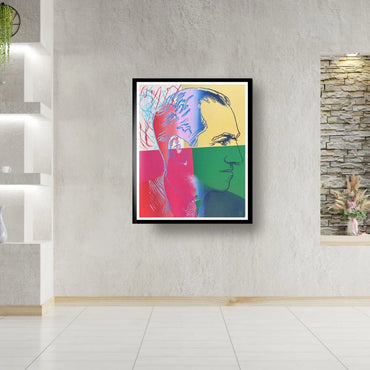 Colorful abstract portrait art piece on a wall in a modern interior setting.