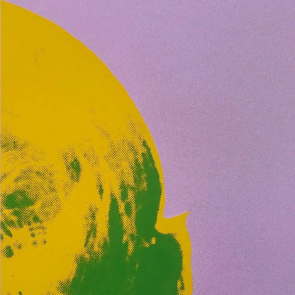 Colorful famous Warhol Pop Art portrait of Marilyn Monroe with a purple diamond dust background Closeup details.