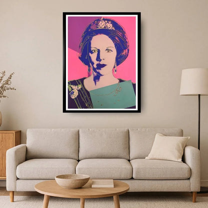Framed artwork of a woman with a tiara on a wall above a beige sofa in a living room.