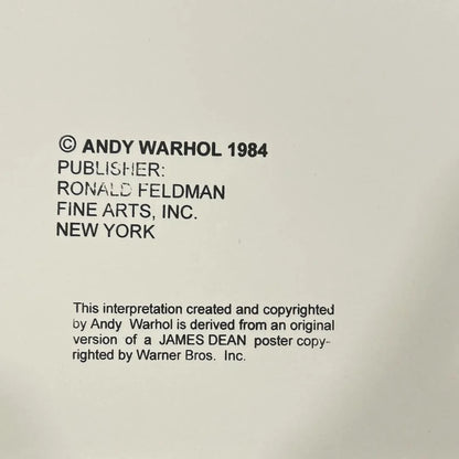Text attribution to Andy Warhol and Ronald Feldman Fine Arts, Inc. on a beige background