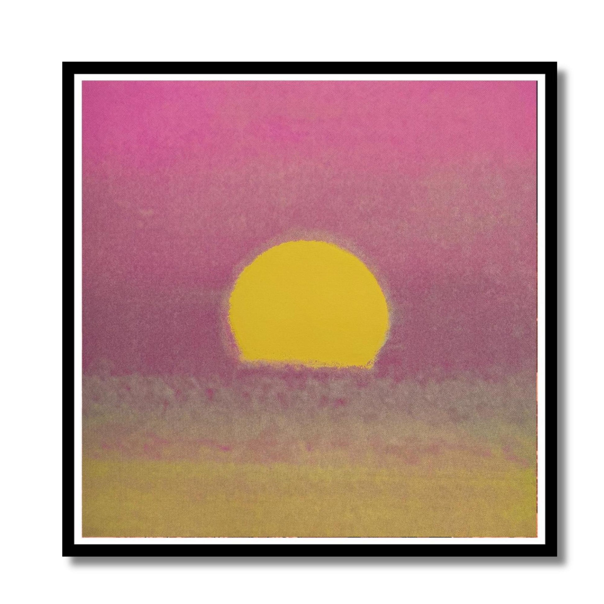 Framed artwork of a yellow sun setting over a pink and purple sky.
