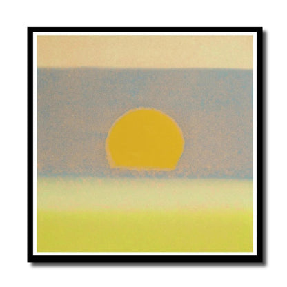 Framed artwork of a stylized sunset with a yellow sun on a beige background