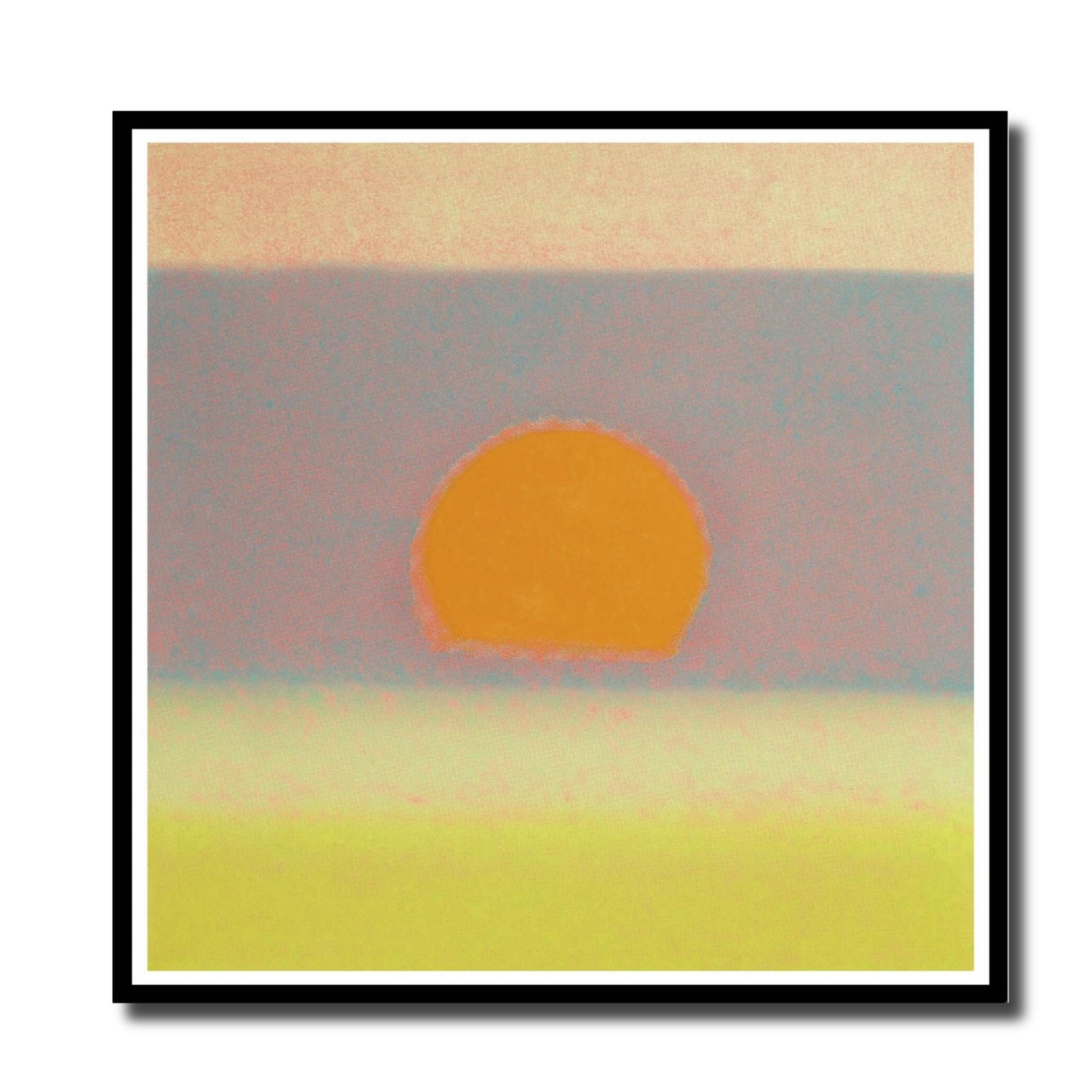 Framed artwork of a stylized sunset with a yellow sun on a pink and blue sky.