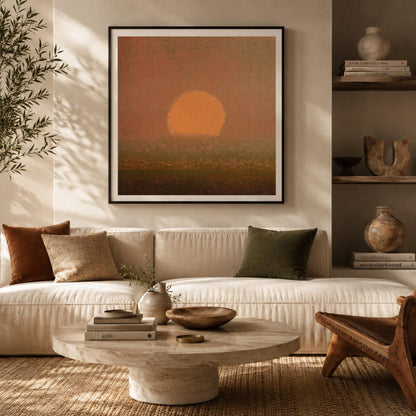 Living room with a beige sofa, wooden coffee table, and wall art of a sunset.