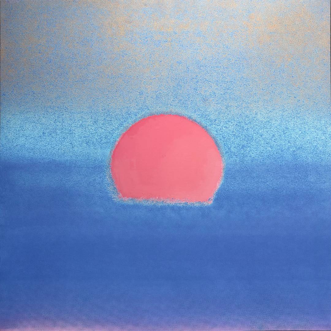 Abstract artwork featuring a large pink sun or circle centered against a textured blue sky-like background with subtle warm beige tones near the top.