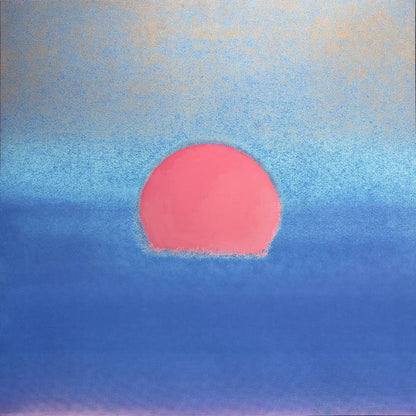 Abstract artwork featuring a large pink sun or circle centered against a textured blue sky-like background with subtle warm beige tones near the top.