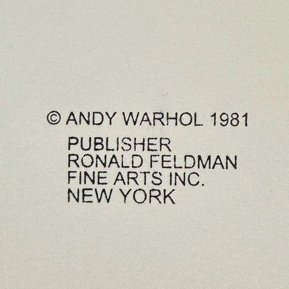 Text attribution to Andy Warhol and Ronald Feldman Fine Arts Inc. on a beige background