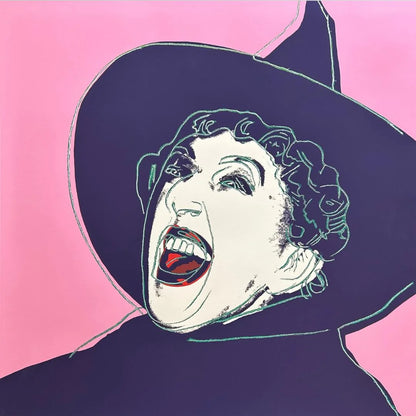 Illustration of the Wicked Witch wearing a large black hat with a pink background