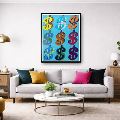 Colorful dollar sign artwork on a wall above a gray sofa in a living room.