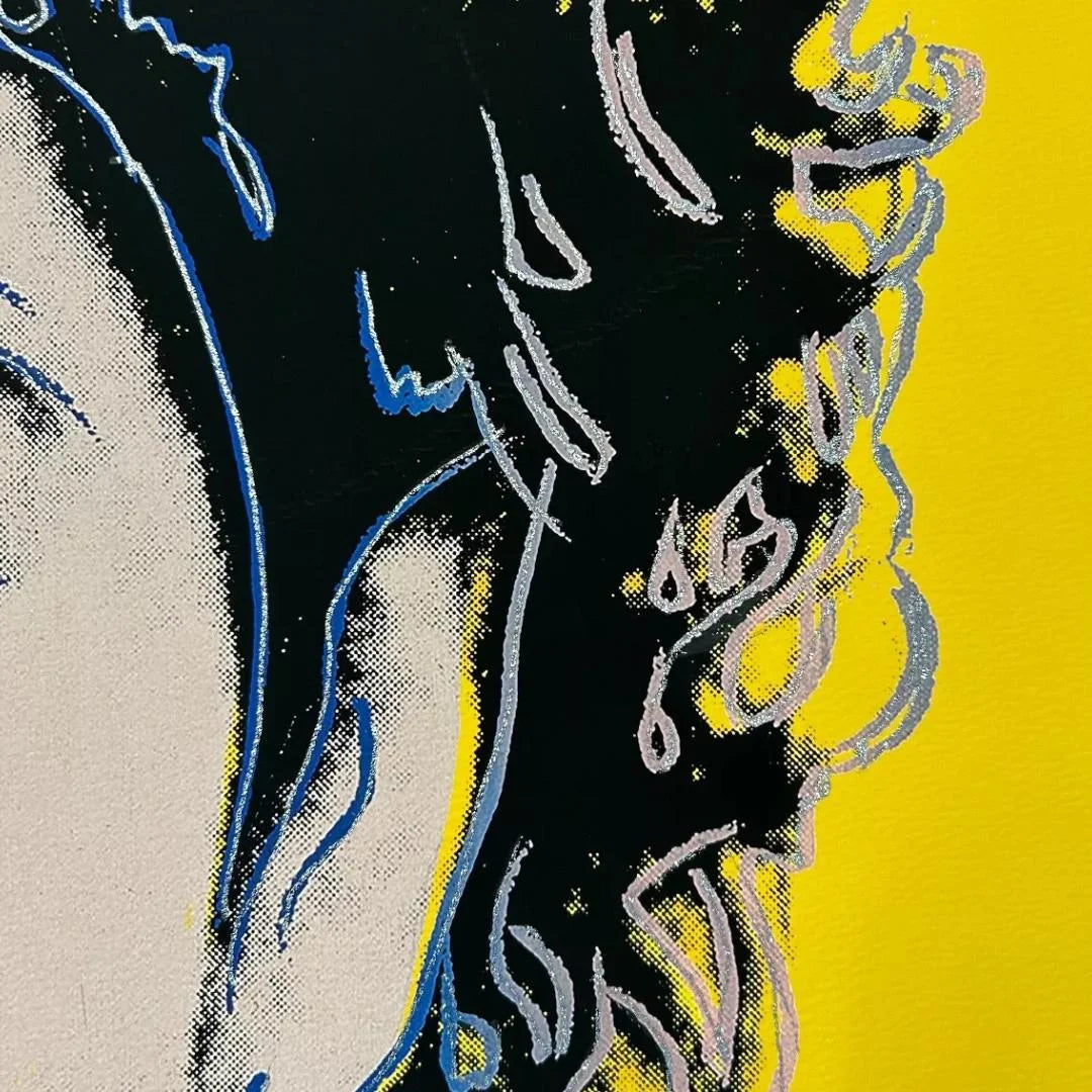 Abstract art with black, white, and blue shapes on a yellow background