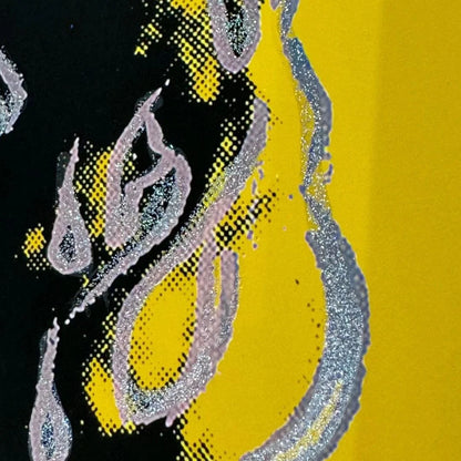 Abstract design with hair on a yellow and black background