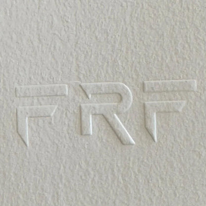 Embossed logo on textured white paper