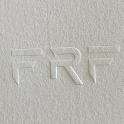 Textured beige paper with embossed publisher