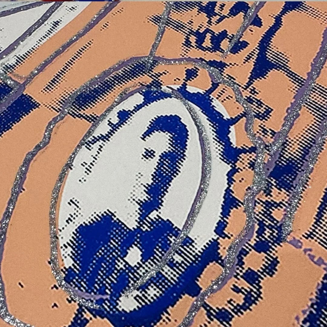 Close-up of a patterned fabric with blue and white design on a brown background