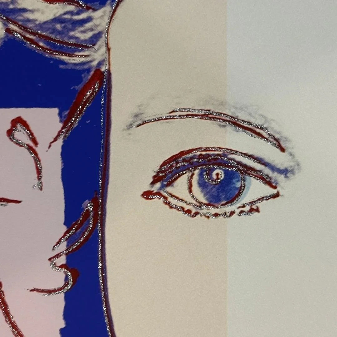 Artistic drawing of a face with a blue eye and red hair on a white background