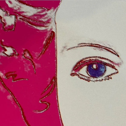 Artistic depiction of a face with a purple eye on a pink background