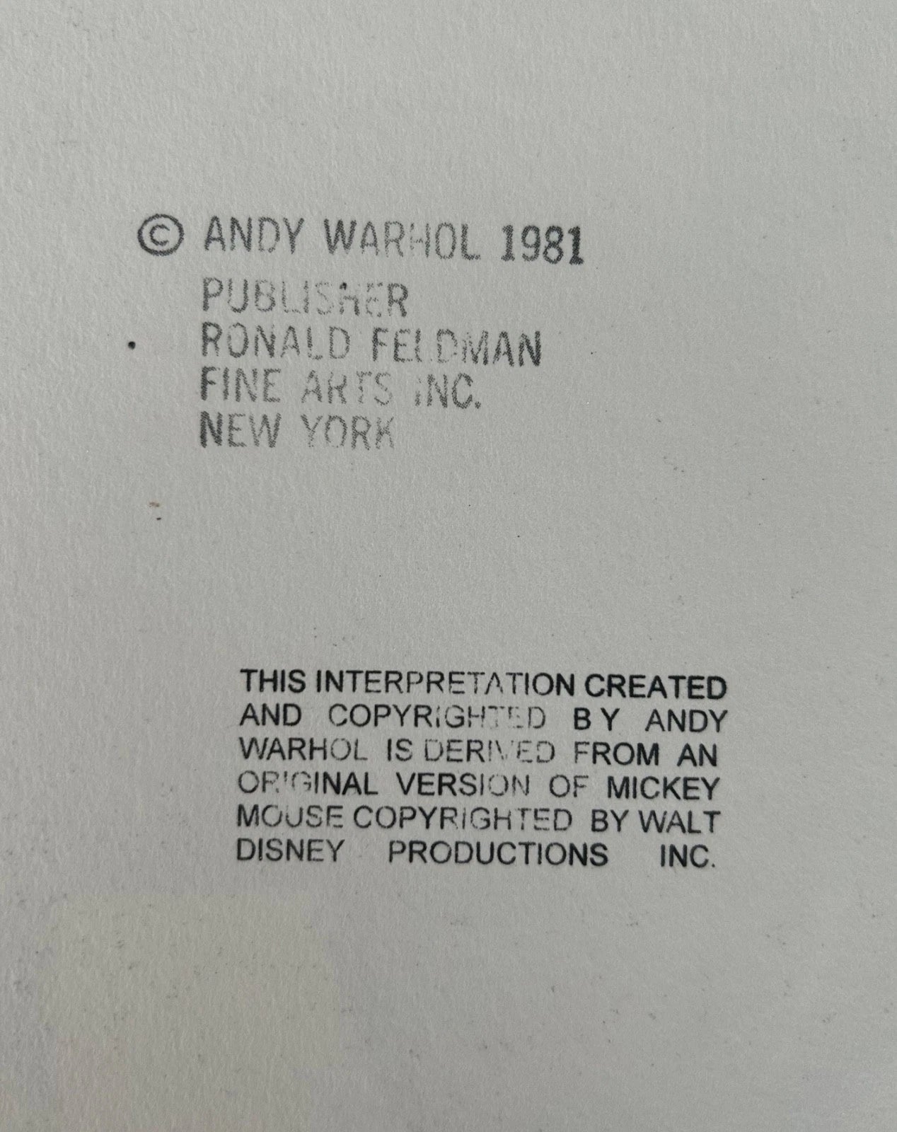 Text attribution to Andy Warhol and Ronald Feldman Fine Arts Inc. on a gray background